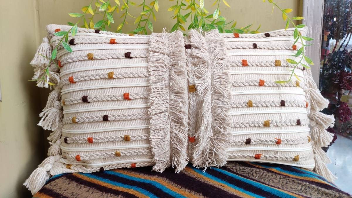 Beautiful handmade tasseled Aari embroidery rectangular cushion cover (30x50 cms)