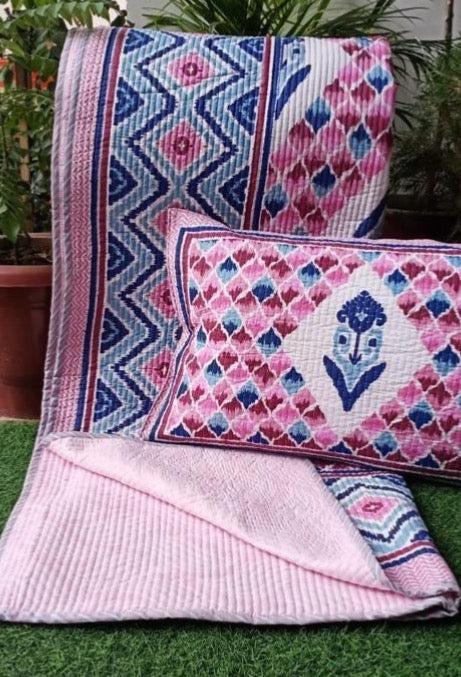 Pure cotton Ikkat quilted and reversible bedcover with two quilted pillow covers (90x108 inches) offer