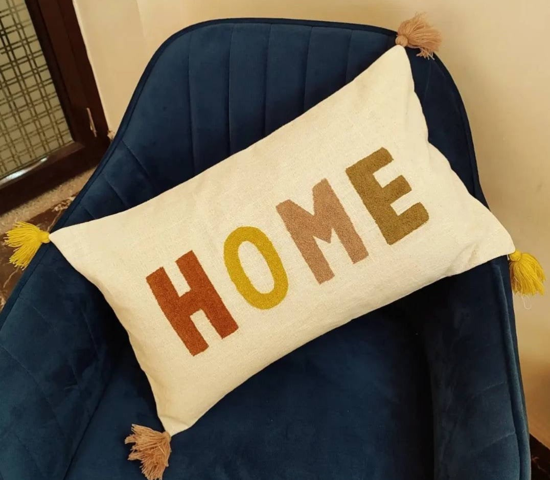 ‘Home” hand embroidered and tasseled rectangular cushion cover (30x50 cms)