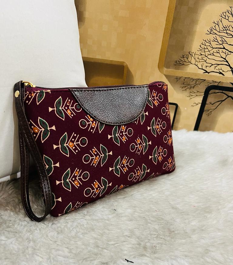 Women’s printed fabric wristlet with zip closure