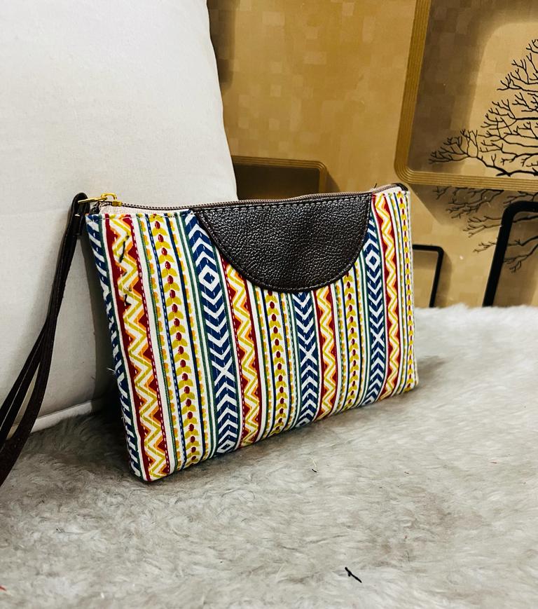 Women’s printed fabric wristlet with zip closure