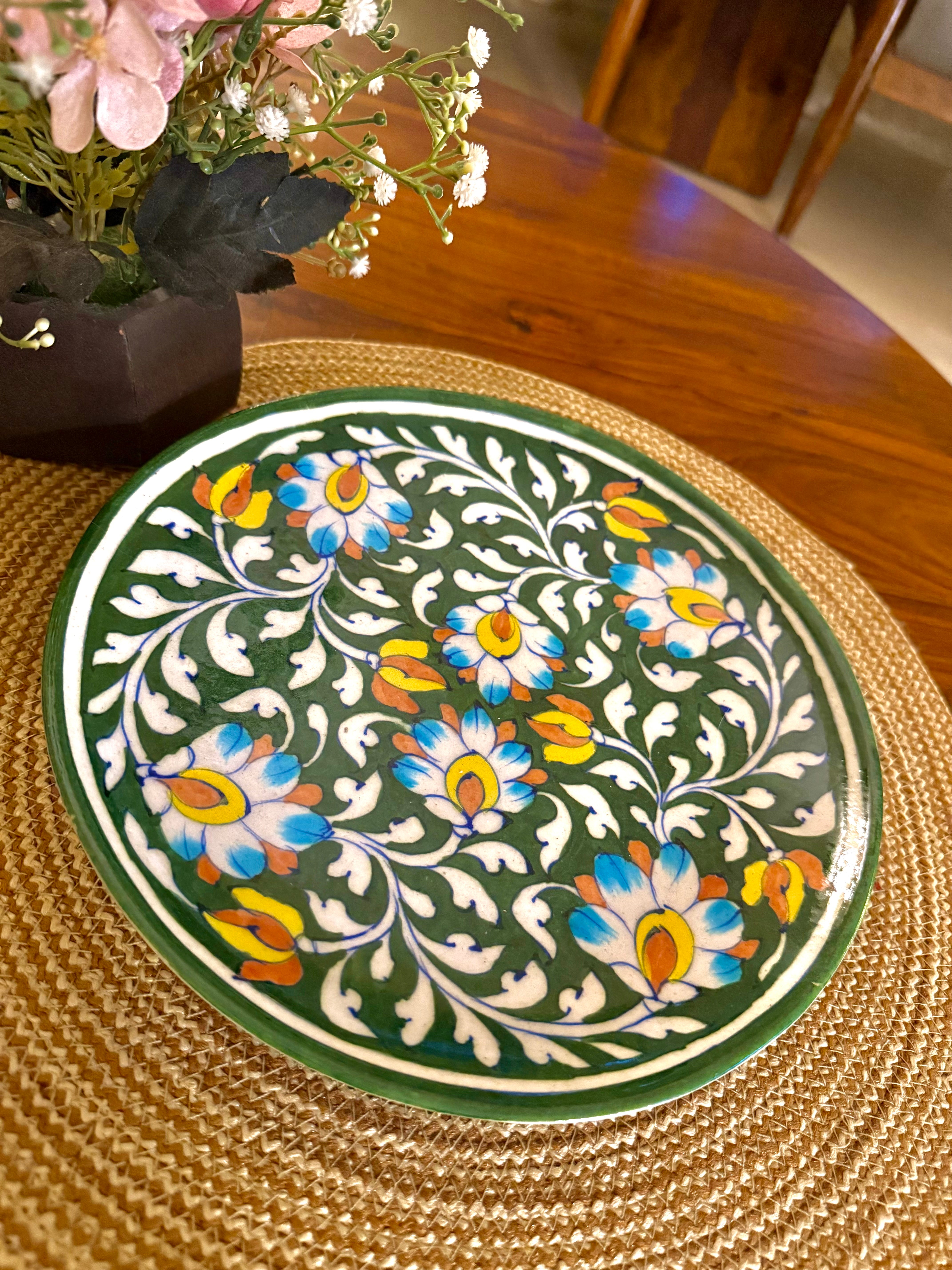 Traditionally hand-crafted blue pottery wall plate