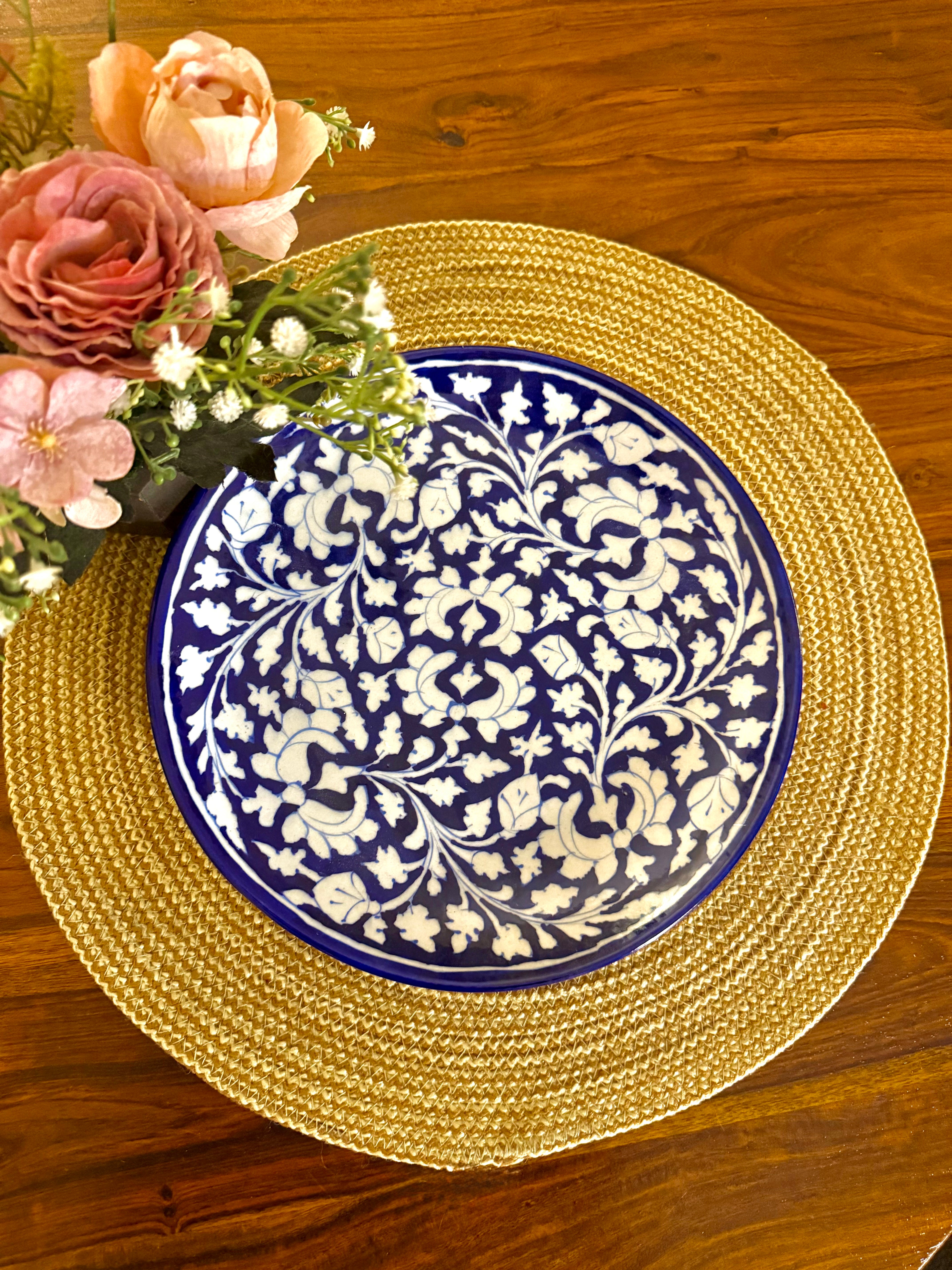 Traditionally hand-crafted blue pottery wall plate