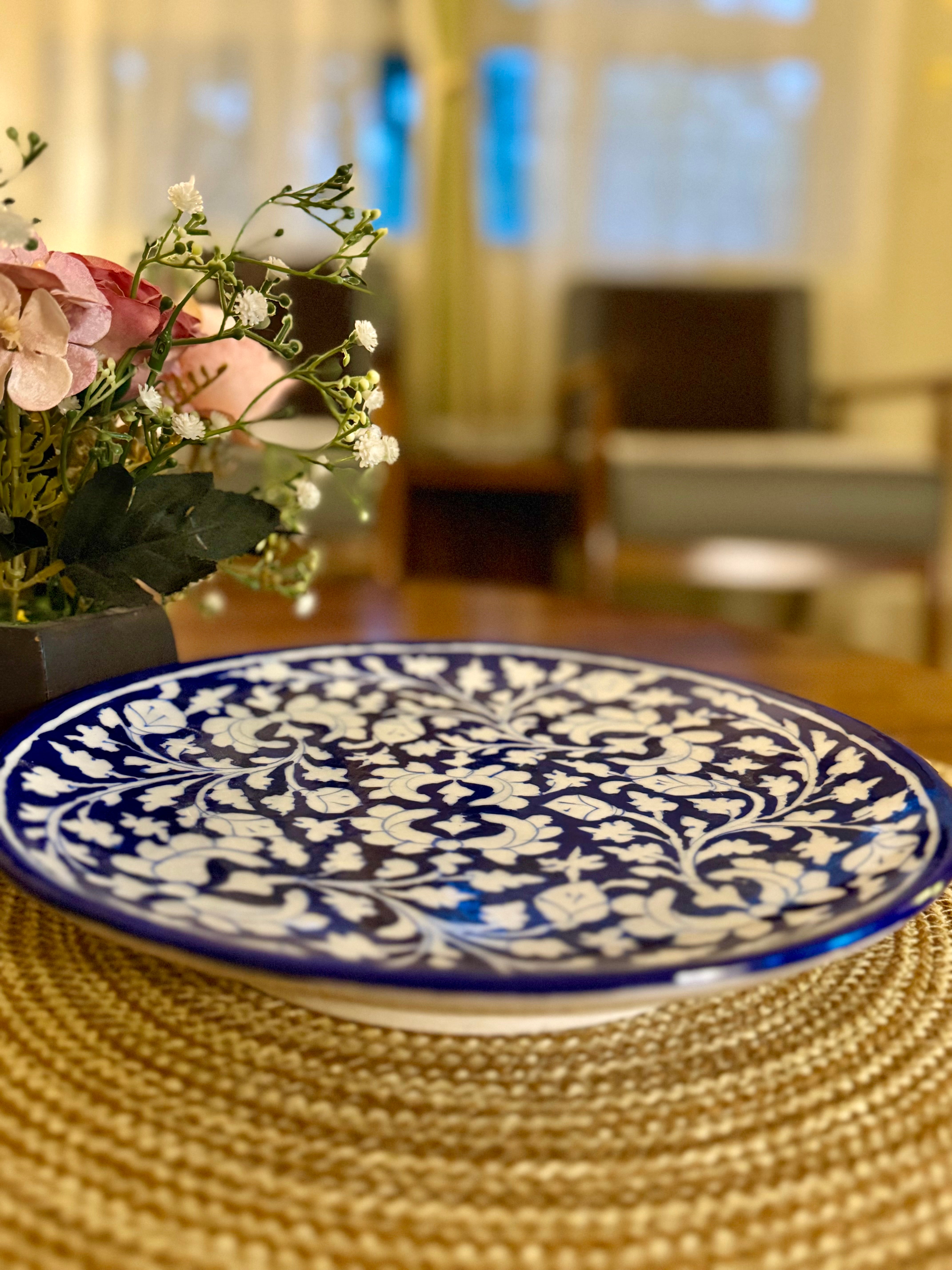Traditionally hand-crafted blue pottery wall plate