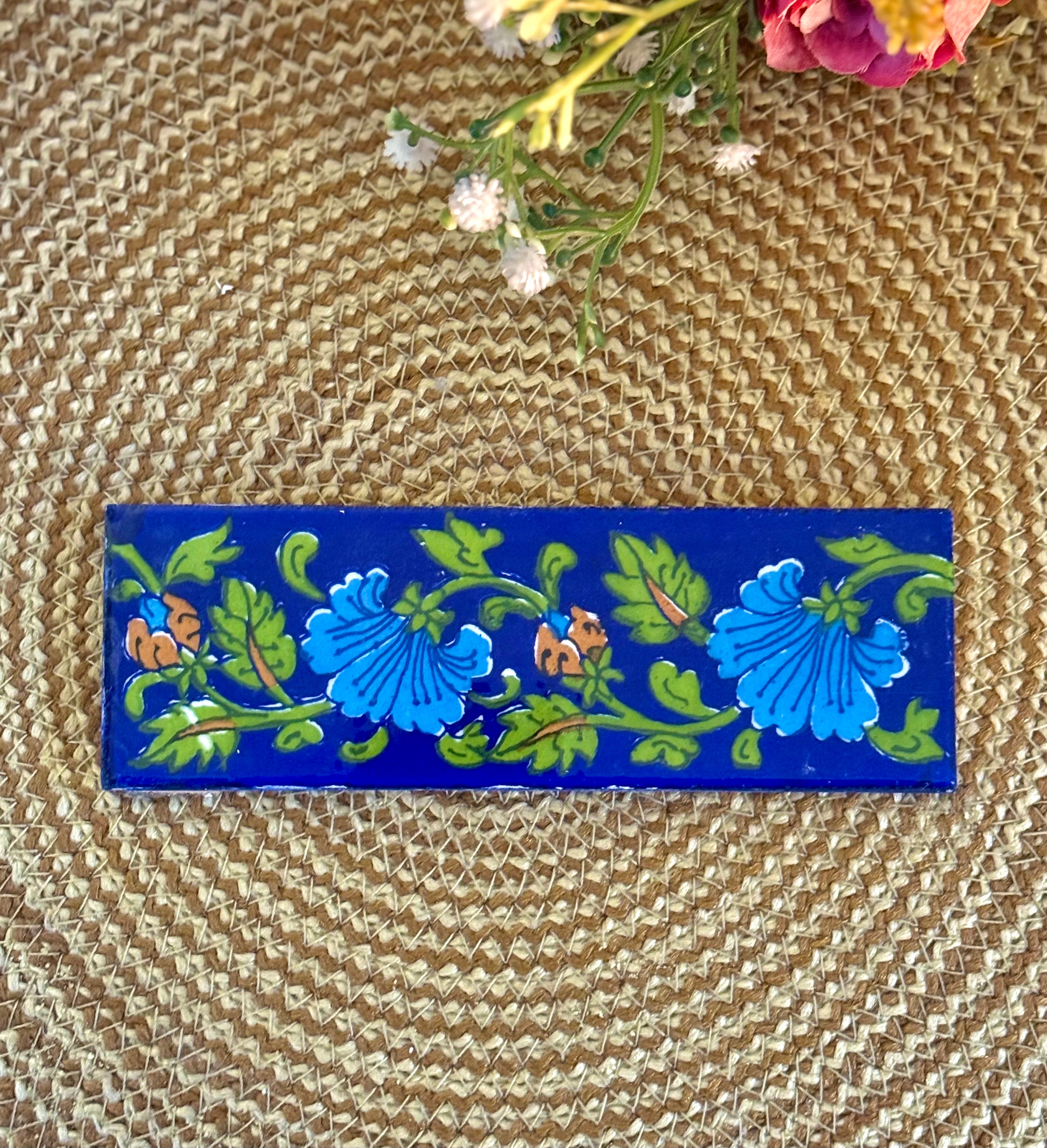Traditionally hand-crafted blue pottery tile