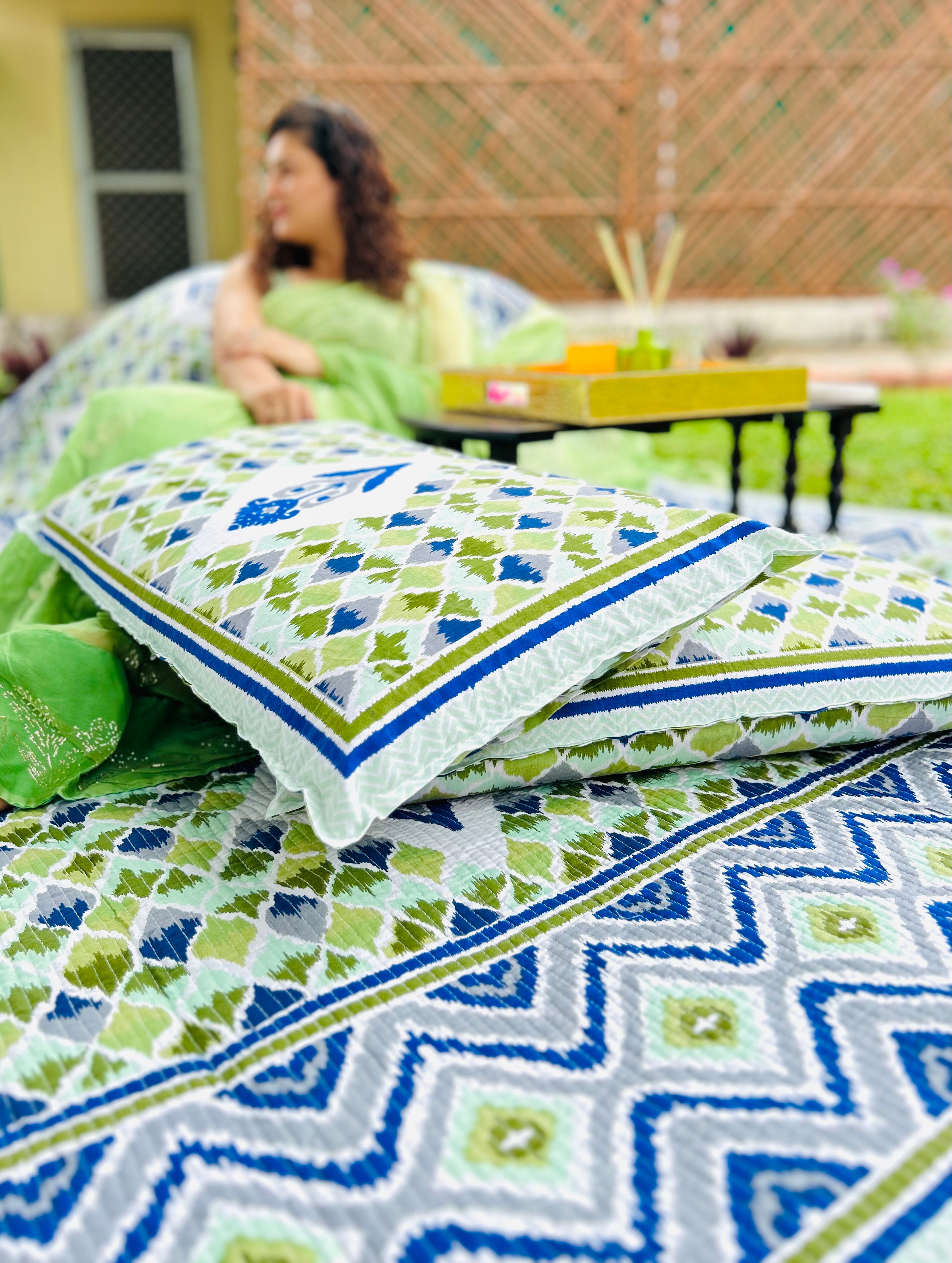 Pure cotton Ikkat quilted and reversible bedcover with two quilted pillow covers (90x108 inches)