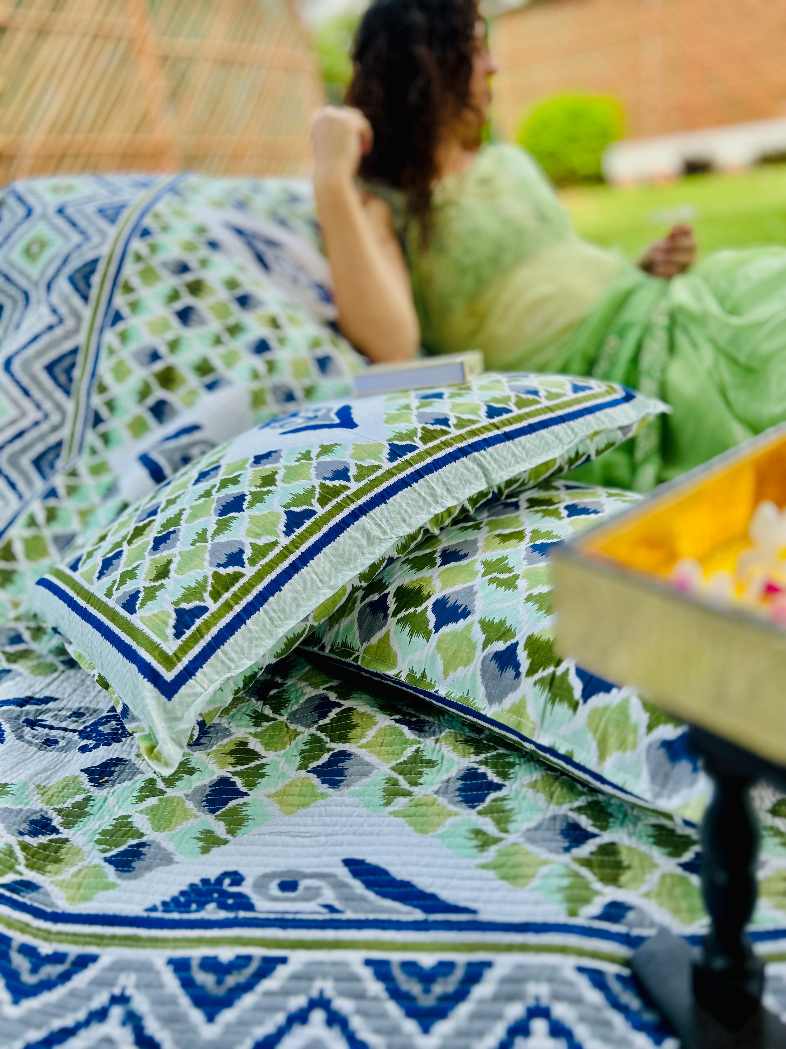 Pure cotton Ikkat quilted and reversible bedcover with two quilted pillow covers (90x108 inches)