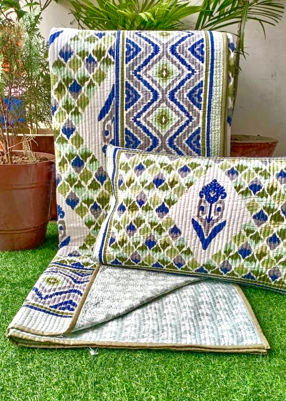Pure cotton Ikkat quilted and reversible bedcover with two quilted pillow covers (90x108 inches)