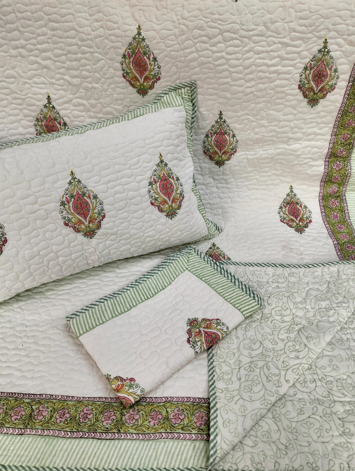 Pure mulmul cotton paani jaal quilted reversible double bedcovers with 2 quilted pillow covers