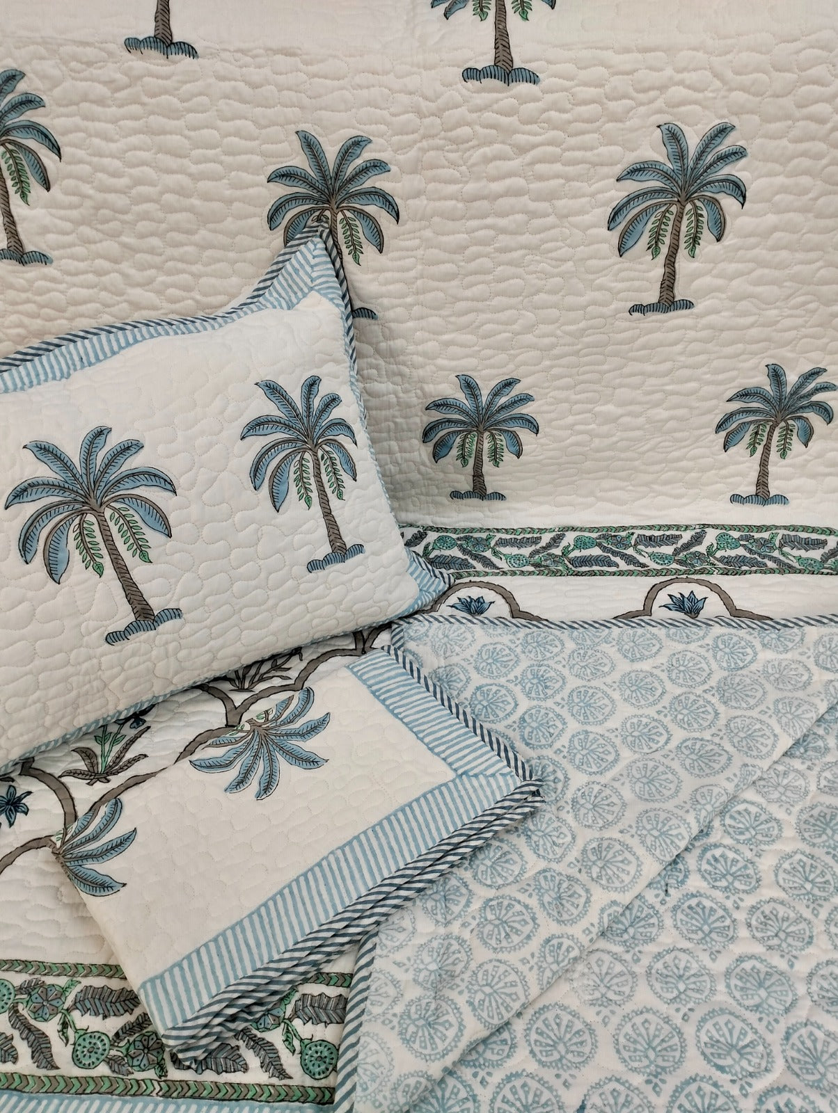 Pure mulmul cotton paani jaal quilted reversible double bedcovers with 2 quilted pillow covers