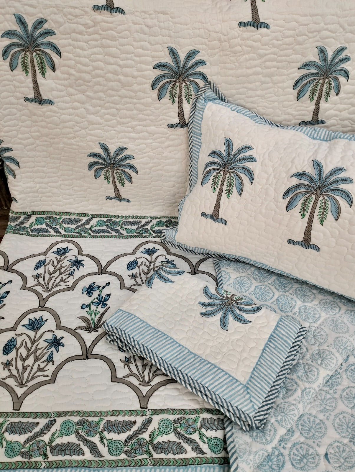 Pure mulmul cotton paani jaal quilted reversible double bedcovers with 2 quilted pillow covers