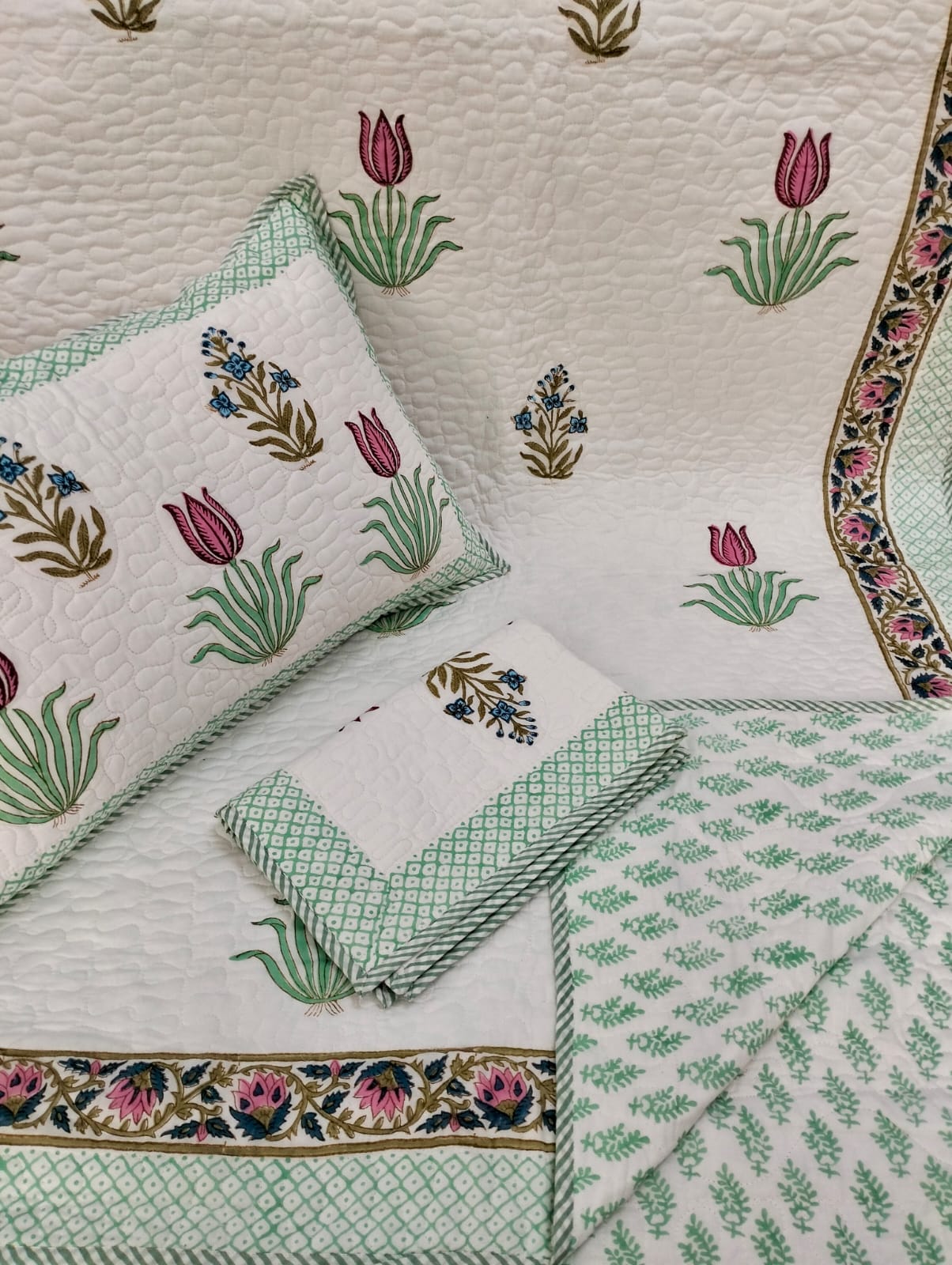 Pure mulmul cotton paani jaal quilted reversible double bedcovers with 2 quilted pillow covers