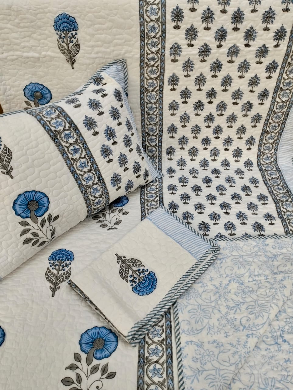 Pure mulmul cotton paani jaal quilted reversible double bedcovers with 2 quilted pillow covers
